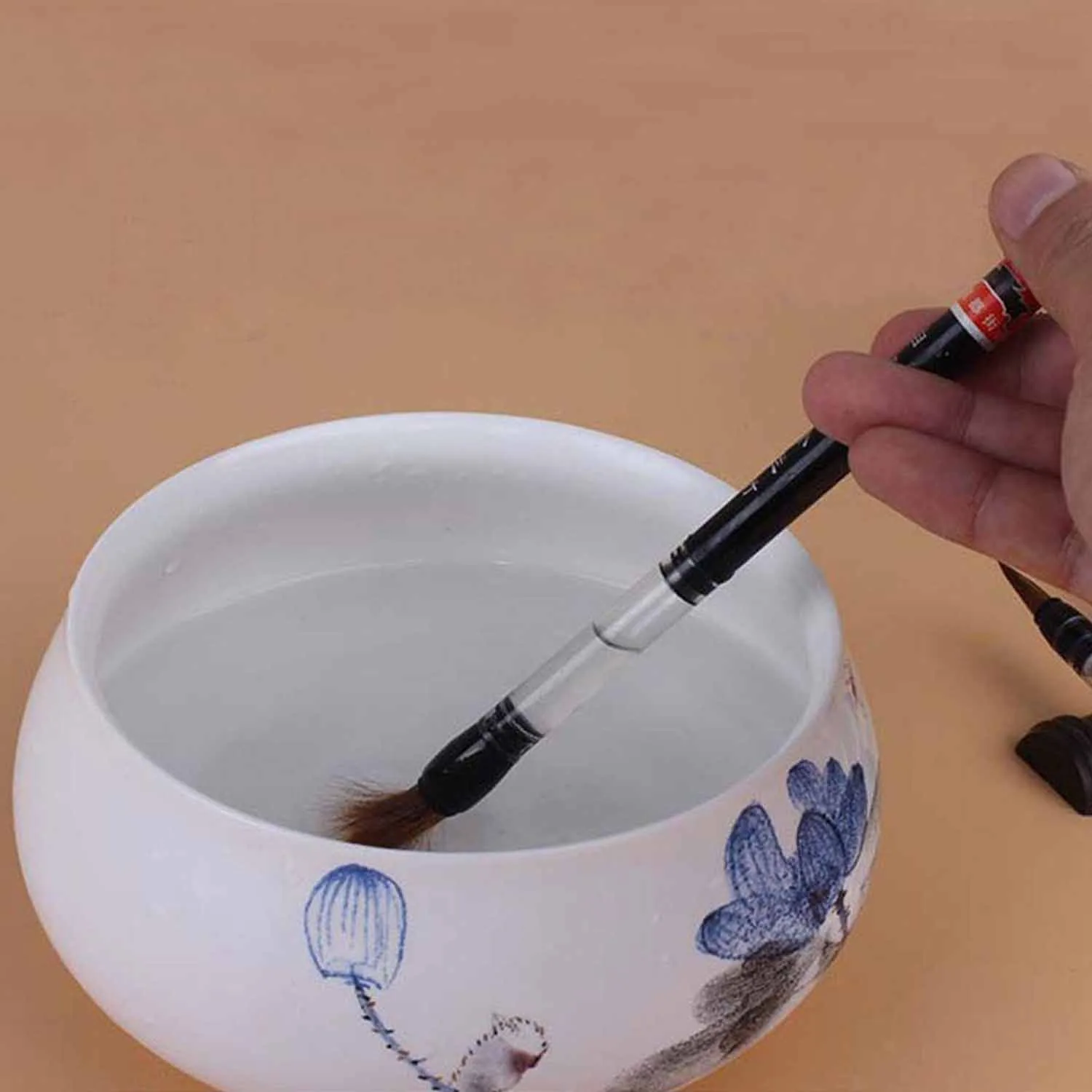 Pincel de agua recargable tipo piston pelo de comadreja y lana surtido 1ud